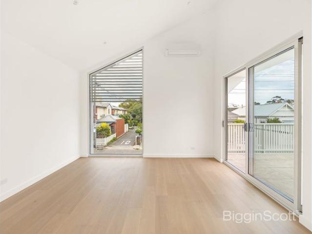 Luxury Bayside Living Just Steps from Nelson Place High End Townhouse with Double Garage & Expansive Balcony, Available Now