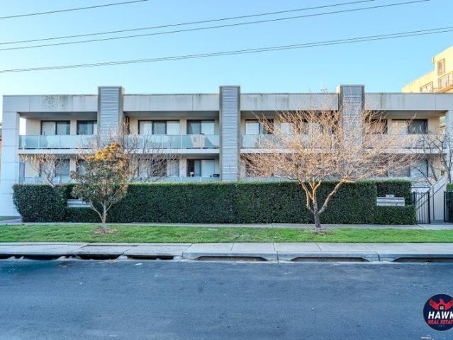 Luxury Ground Floor Living with Two Expansive Private Courtyards in the Heart of Crestwood!
