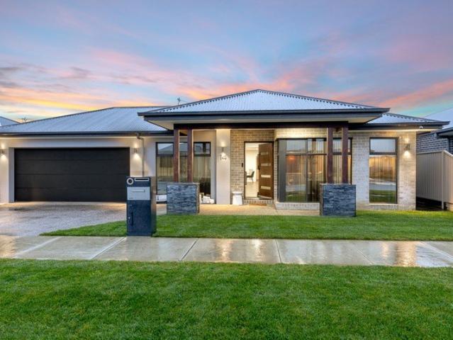 Luxury Family Home With Multiple Living Zones & High End Finishes!