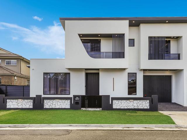 Luxury Family Home with Pool & Home Cinema | $1,550 Per Week