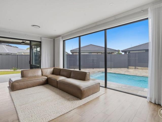 Luxury Family Living with Pool, Multiple Living Areas & Premium Finishes