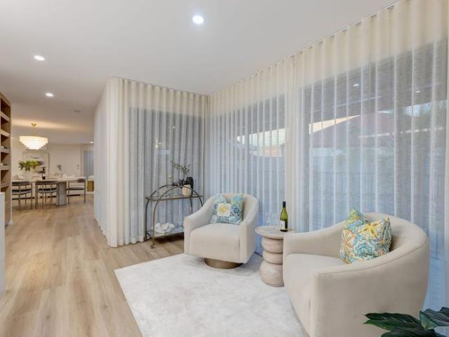 Luxury Family Living Redefined in Ormiston Designer Renovation with Poolside Entertaining