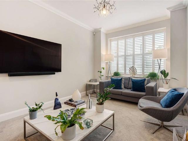 Luxury five bedroom home with landscaped gardens in a private setting, ideally located near central Cheadle Hulme
