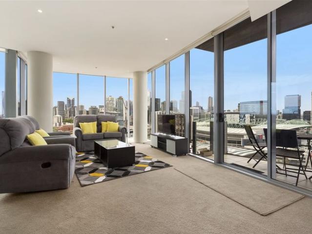 Luxury, fully furnished 20th top floor, 3 bedroom penthouse, with views across Victoria Harbour Docklands Melbourne CBD via a private balcony