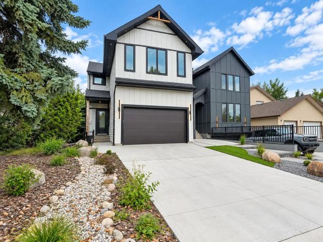Luxury Home containing legal basement Suite in Prestigious Grandview He