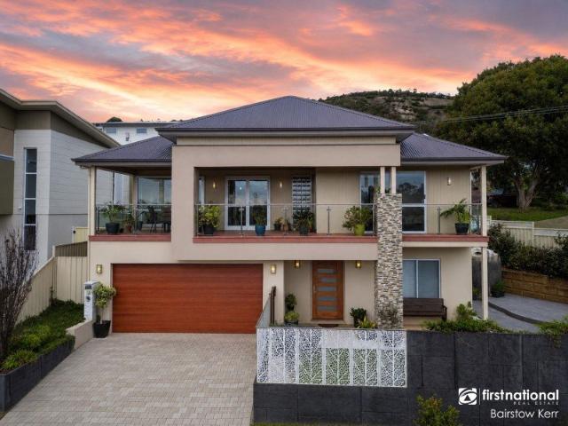Luxury Hillside Masterpiece with Panoramic Middleton Beach Views