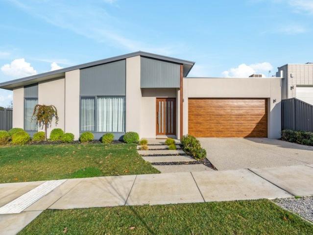 Luxury, Low Maintenance Living with Premium Upgrades Throughout