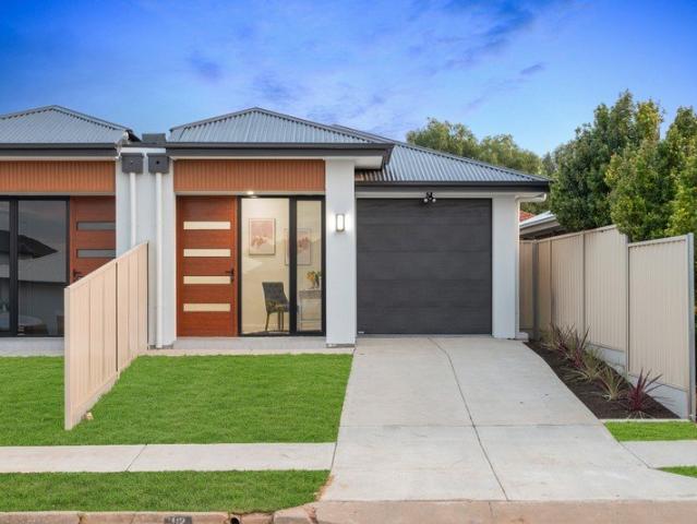 Luxury, Low Maintenance Living in a Brand New Home