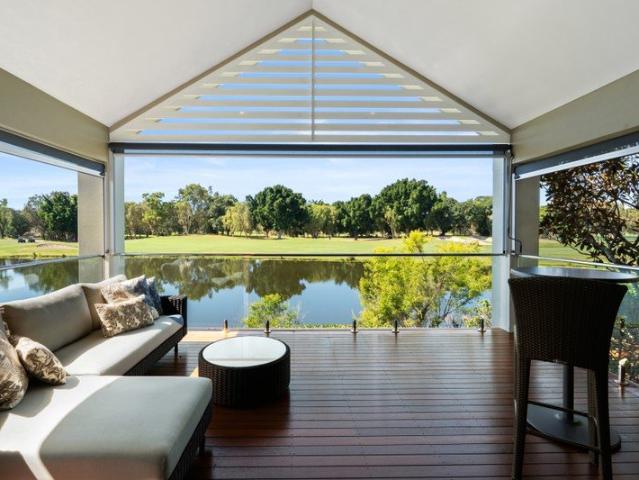 Luxury Lakefront Residence Overlooking Glades Golf Course