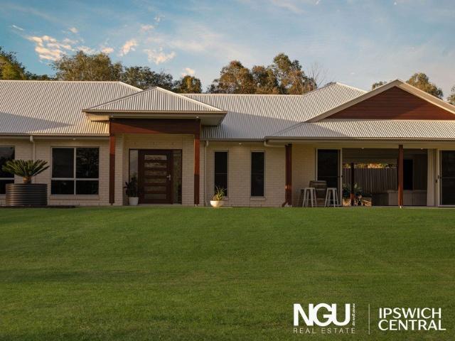 LUXURY LIVING, MASSIVE SHED & PARKING FOR 12 ON NEARLY 2 ACRES