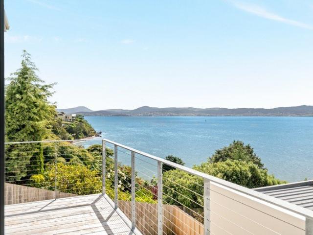 Luxury Living On Sandy Bay's Golden Mile