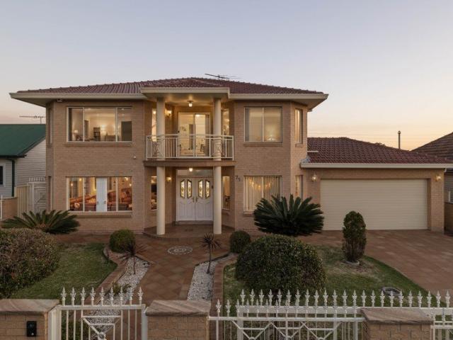 Luxury Living, Full Brick, Master Built Family Home on a Huge 771m2 Flat Block