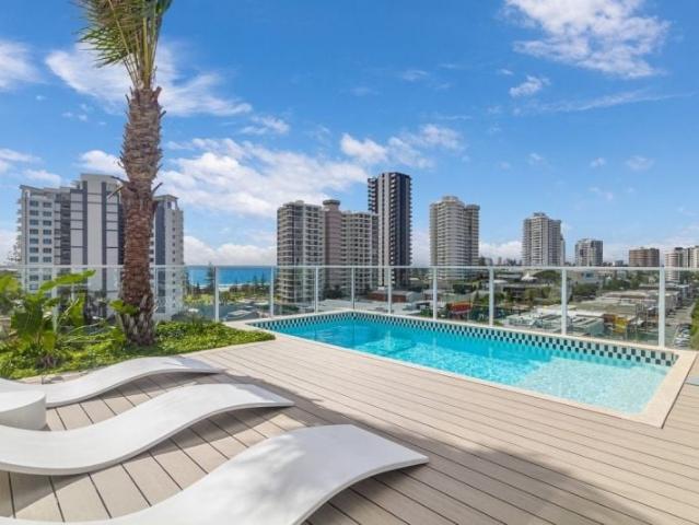 LUXURY LIVING IN THE HEART OF COOLY!