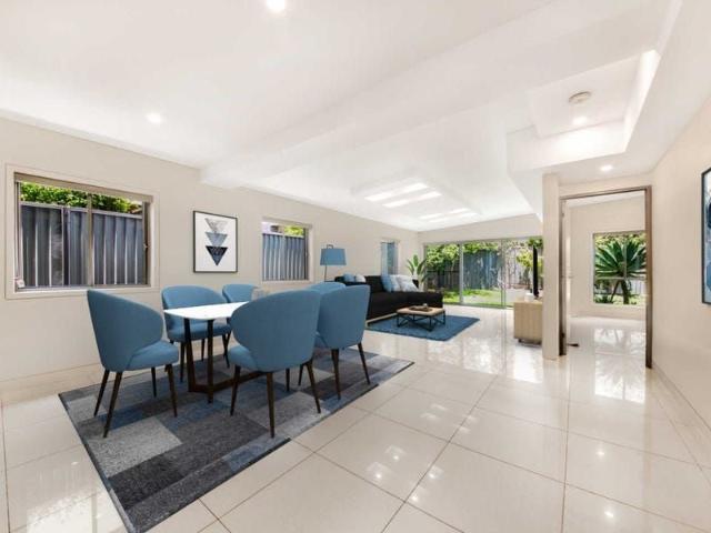 Luxury Living in This Beautiful Five Bedroom Duplex!