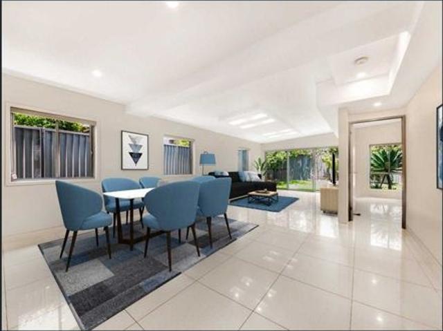 Luxury Living in This Beautiful Five Bedroom Duplex!