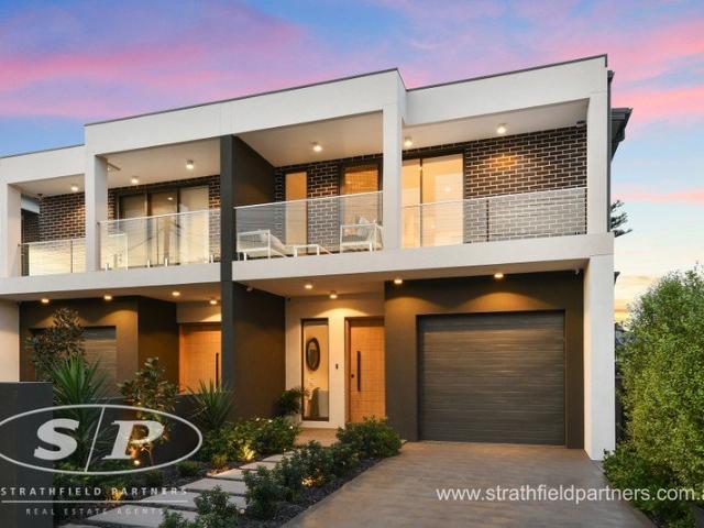 Luxury Near New Duplex with Exceptional Family Appeal