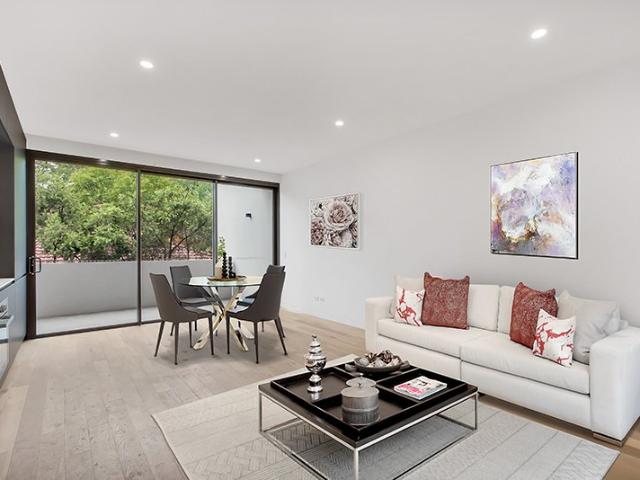 Luxury Near New Two Level Apartment in Prime Location