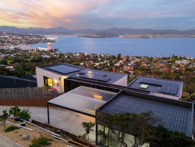Luxury Sandy Bay Home with Level Access & Sweeping Views