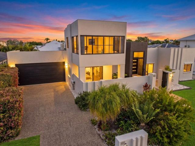 Luxury Single Level Living, Waterfront Lifestyle, & a Pool Area That Steals the Show!