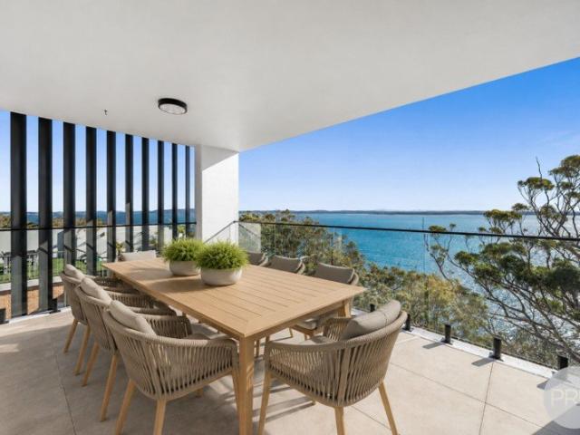 Luxury Penthouse Living with Panoramic Bay Views