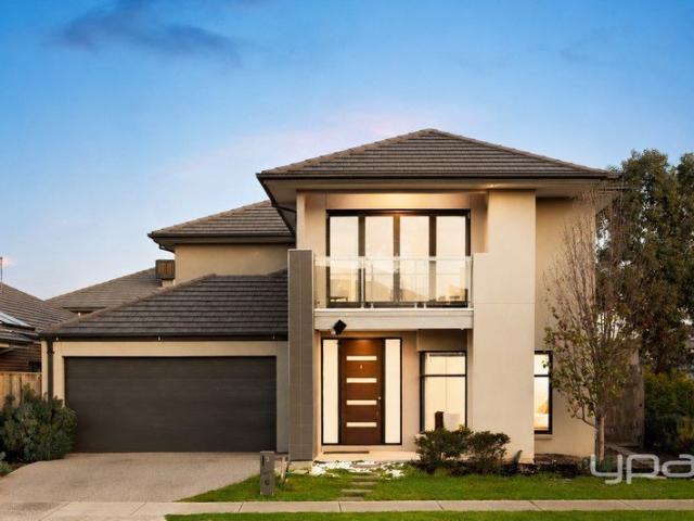 Luxury Redefined Grand Family Living with Two Master Suites & Butler's Pantry!