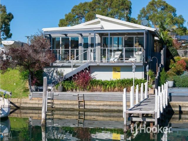 LUXURY WATERFRONT LIVING WITH JETTY BERTH