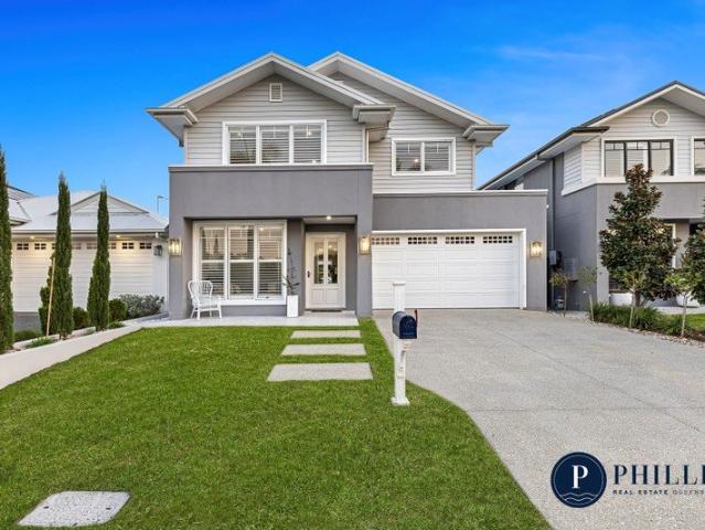 ONE OF A KIND. TRULY UNLIKE ANY OTHER! This fully custom abode is something you absolutely must see for yourself!