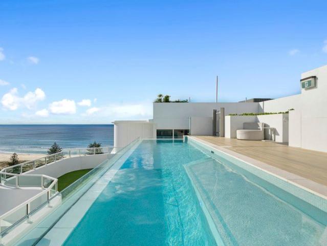 Luxury Top Floor Living Framed by Ocean, Sweeping Hinterland Views