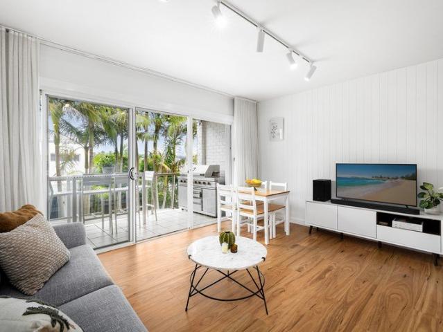 Luxe coastal living just metres from the sand and surf