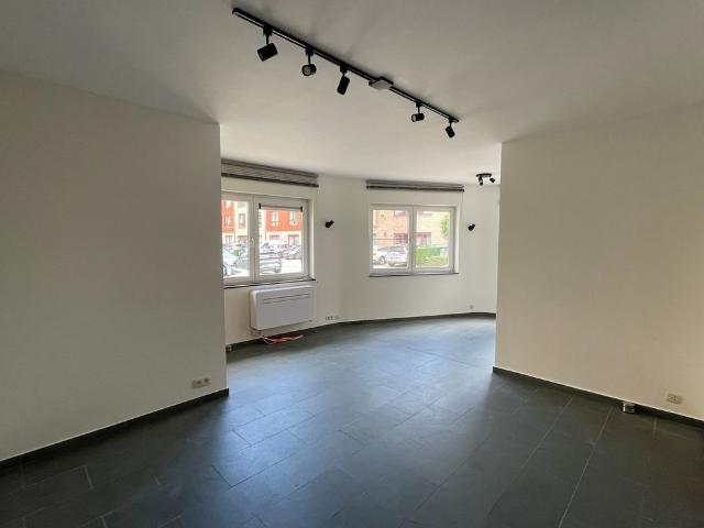 Luxe, energiezuinig gelijkvloers appartement te Koningslo met terras, inclusief dubbele garage
