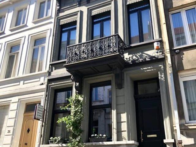 Luxe herenwoning met zonnige stadstuin in Harmoniewijk