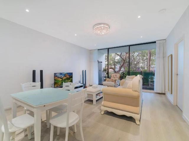 Macquarie Central Tranquil Urban Living | North West Aspect Lush Outlook | Grand Light Fittings & Versatile Timber Floor | Oversized Study