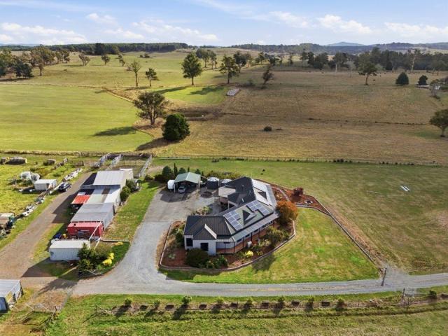 Magnificent 100 acre property. Large, modern, home. Dams, River, Sheds