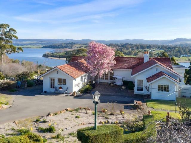Magnificent Waterfront Home with Timeless Elegance and Space