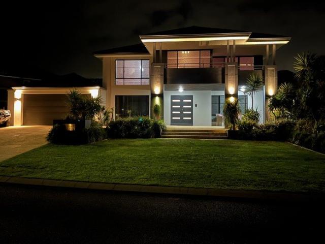 Magnificent Executive Family Home with Pool, Workshop and Golf Course Outlook