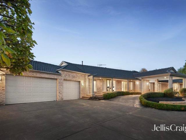 Magnificent garden sanctuary with dual master suites