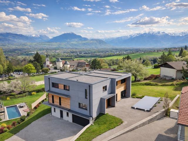 MAGNIFIQUE MAISON MODERNE SUR LA COMMUNE D'ESERY AU PIED DU GOLF