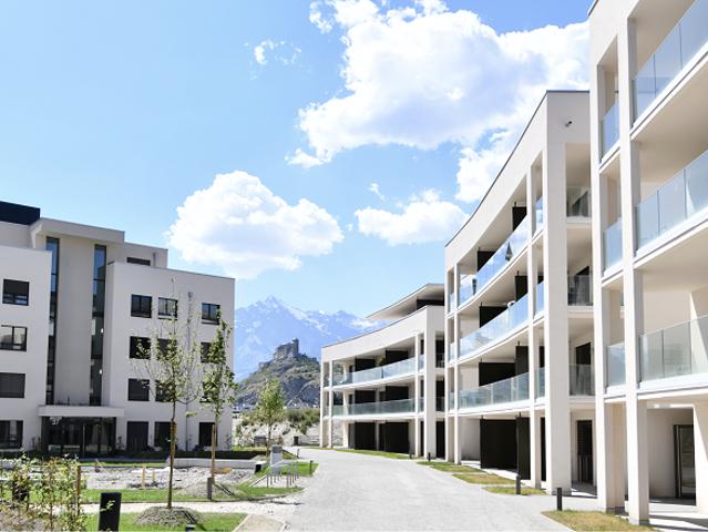 Magnifique appartement de 2.5 pièces au 1er étage d'un immeuble neuf avec balcon E102