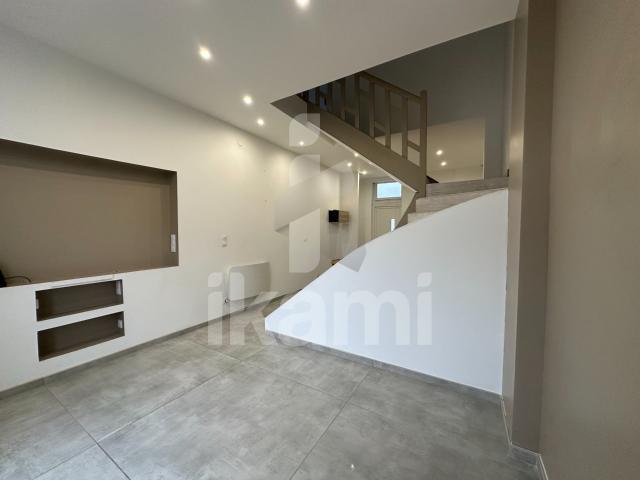 Magnifique duplex lumineux avec terrasse, jardin et garage environnement calme