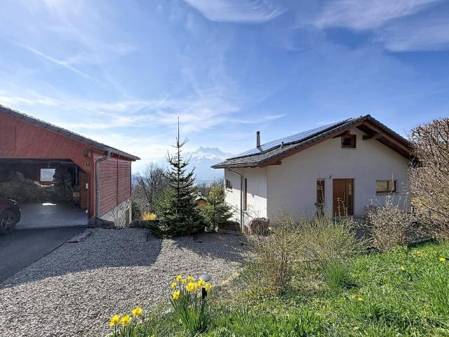 Magnifique villa d'architecte avec spectaculaire vue panoramique sur la plaine et les Dents du Midi