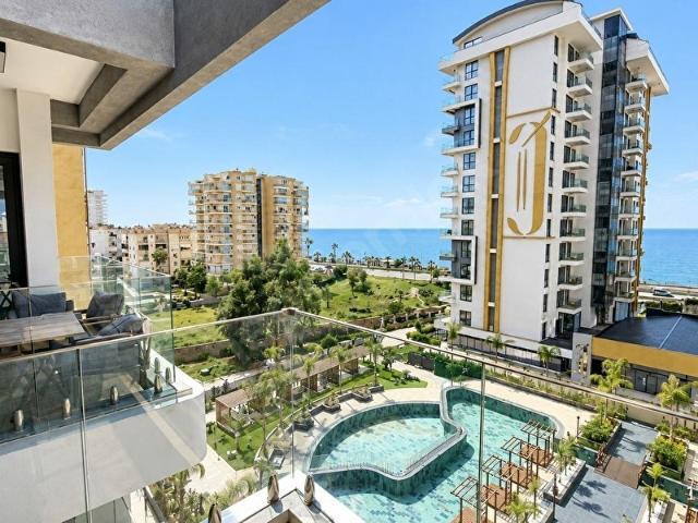 MAHMUTLAR SAHİLDE ACİL SATILIK 1+1 DAİRE FULL DENİZ MANZARASI DENİZE SIFIR KONUM FULL EŞYALI