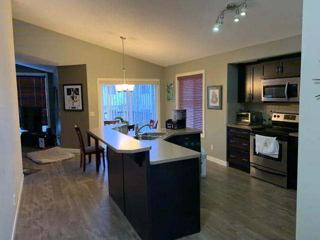 Main Floor of Airdrie Home + Separately Paid Supportive Roommate Opportunity — 3 Bedrooms Main Floor