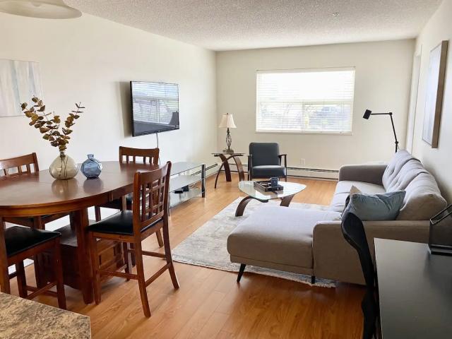 Main Floor Furnished Condo on West Side Overlooking Park