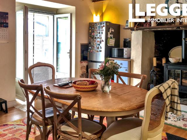 Maison 3 chambres avec véranda, jardin, garage et parking, à 5 min des commerces