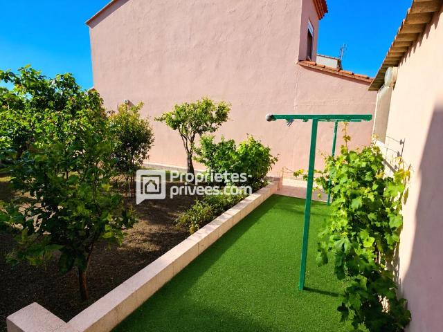 Maison 3 faces de 110 m² avec jardin de 400 m²