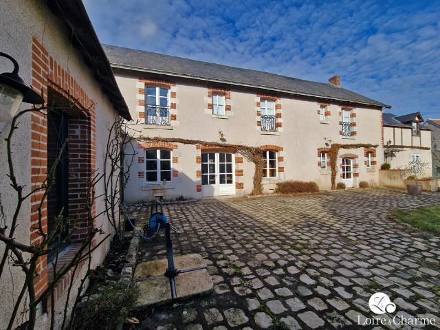 Maison 10 pièces 370 m²