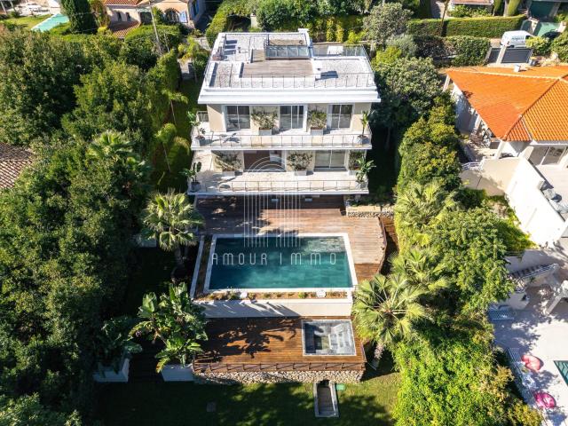 Maison 10 pièces 334 m²