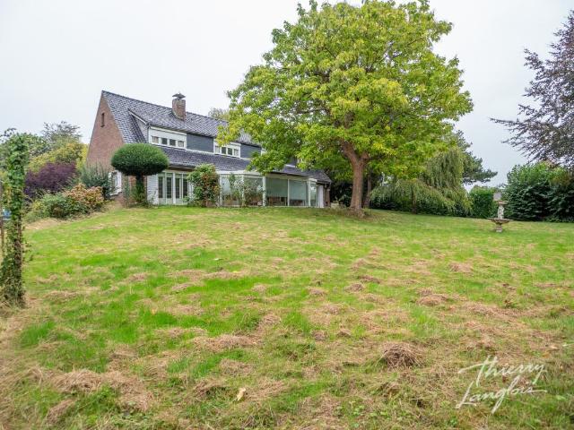 Maison 10 pièces 334 m²