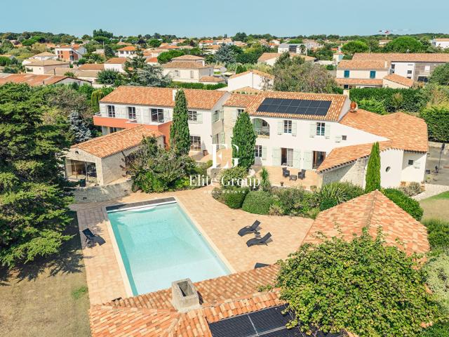 Maison 10 pièces 450 m²