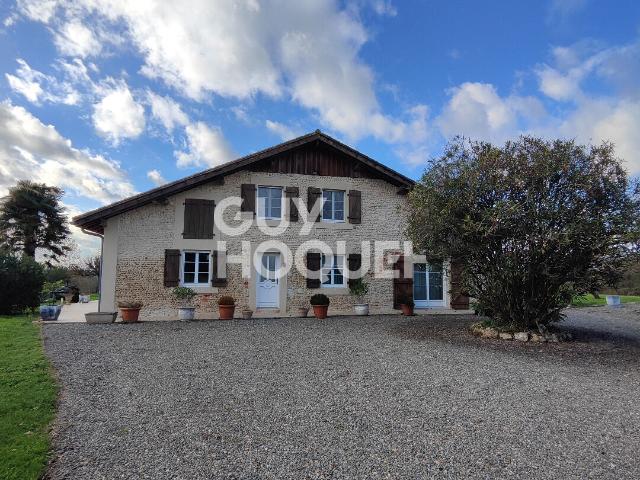 Maison 11 pièces 232 m²